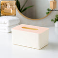 Modern rectangular tissue box holder on a table, showing sleek design