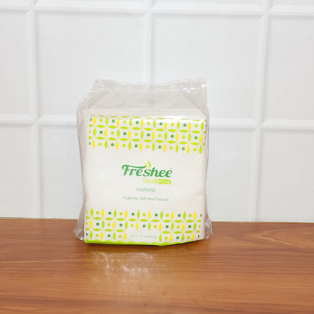 Single disposable paper napkin featuring embossed absorbent texture