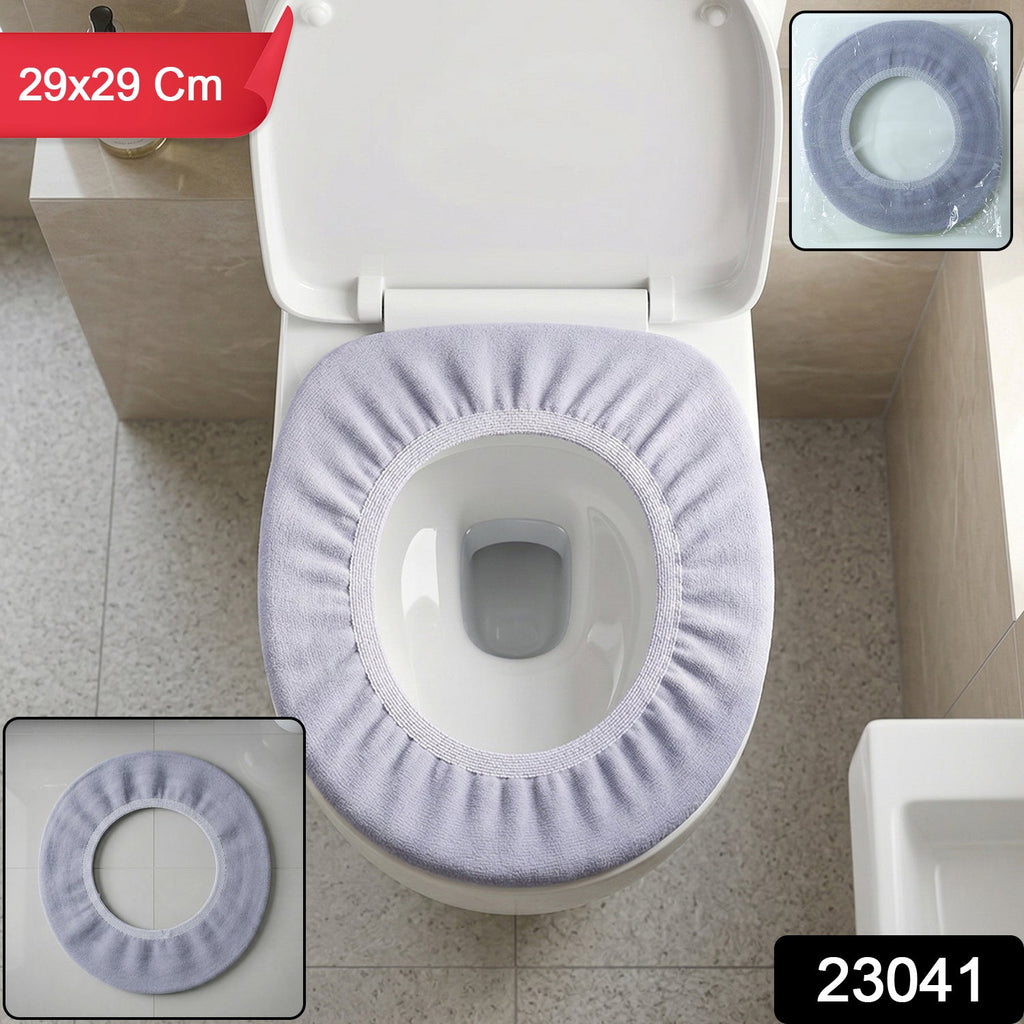 White toilet seat cover stretched on bathroom toilet