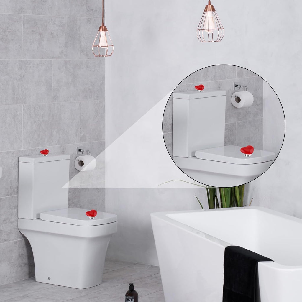 Yellow heart-shaped toilet tank button for practical bathroom use