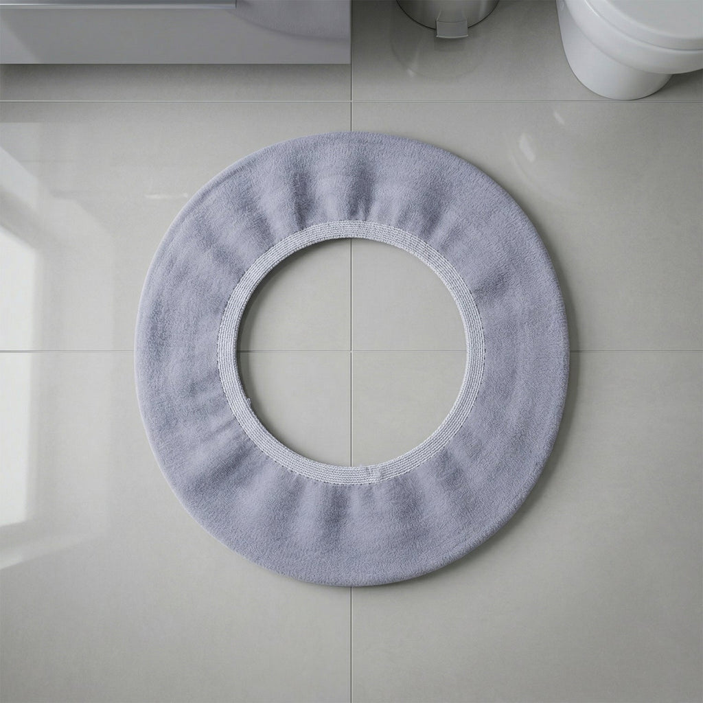 Stretchable toilet seat cover shown separately for demonstration