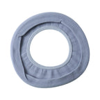 Toilet seat with soft fabric cover installed for hygiene