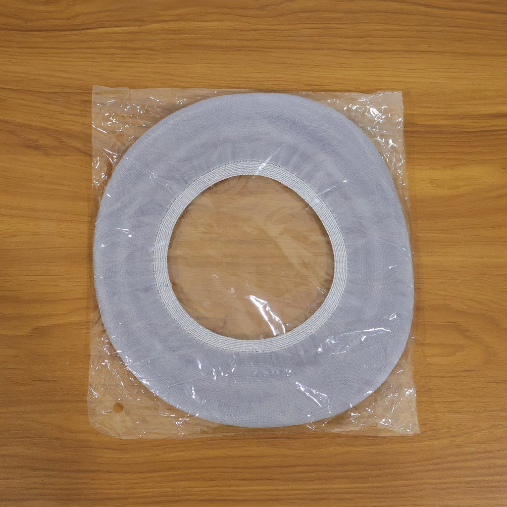 Bathroom setting with soft fabric toilet seat cover