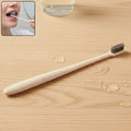 A MintGuard Soft-bristle Toothbrush made from wheat straw, shown upright for daily dental care.