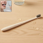 A MintGuard Soft-bristle Toothbrush made from wheat straw, shown upright for daily dental care.