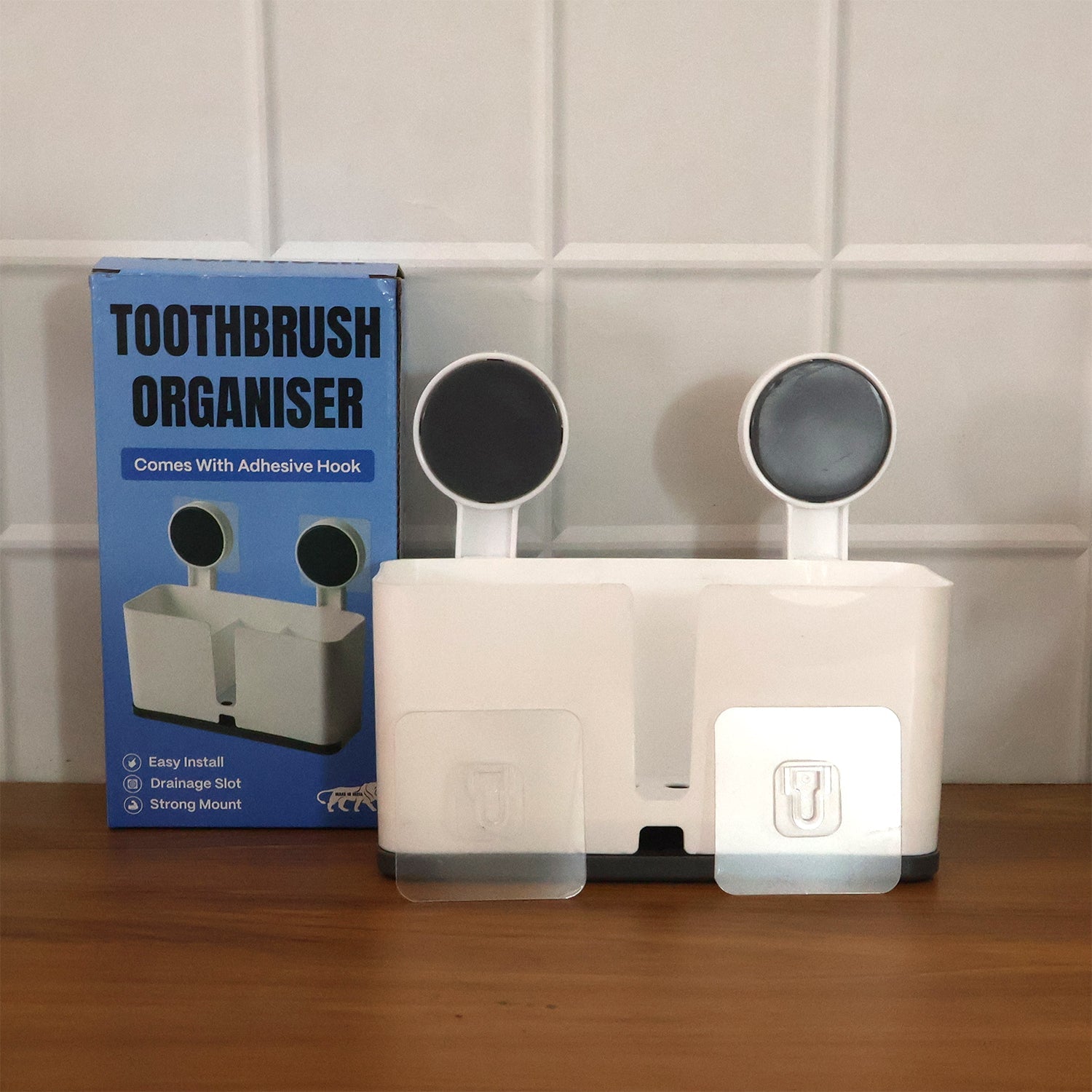 Adhesive tape on wall mounted toothbrush holder for easy installation