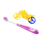 Child holding panda kids toothbrush during brushing