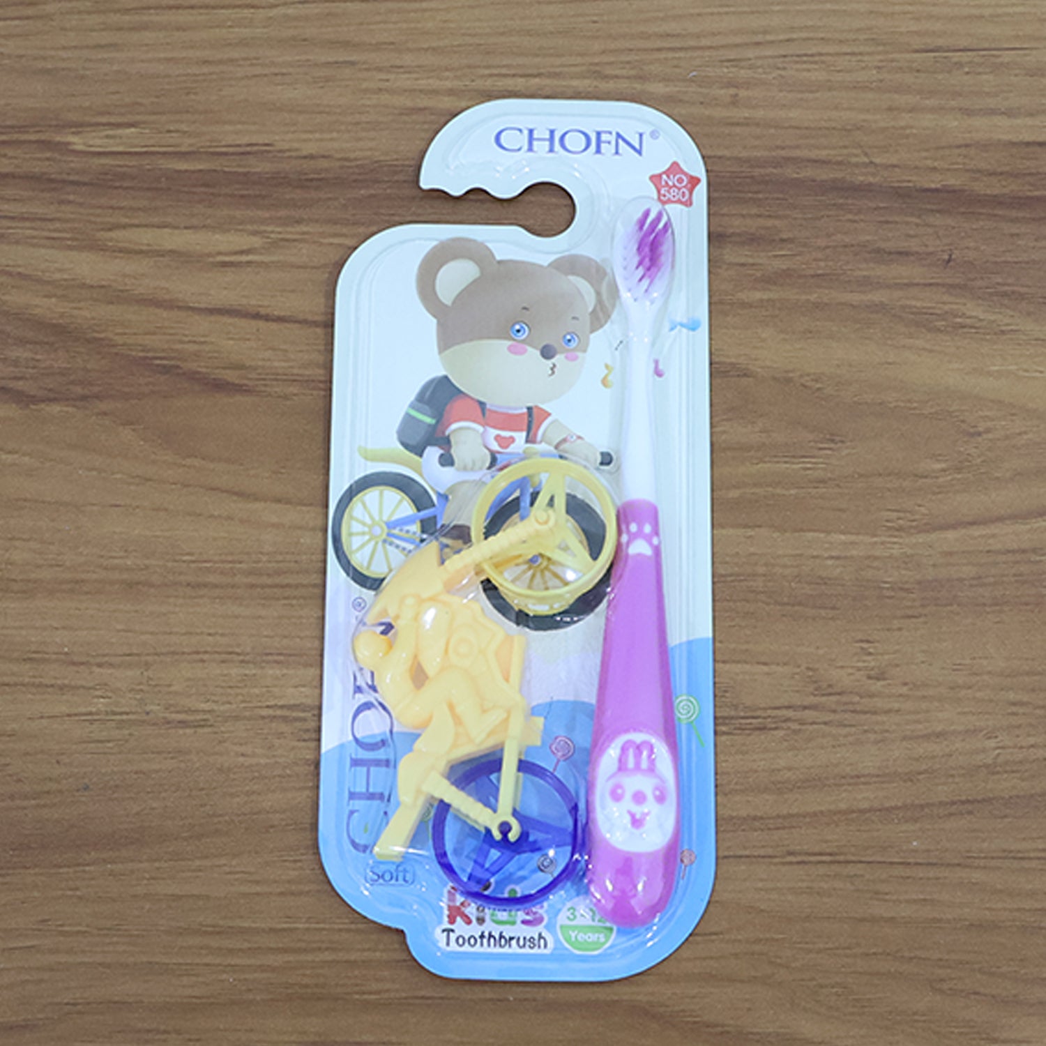 Complete kids oral care set with panda toothbrush and motorcycle toy