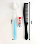 Toothbrush, toothpaste, and comb neatly packed in a travel hygiene kit