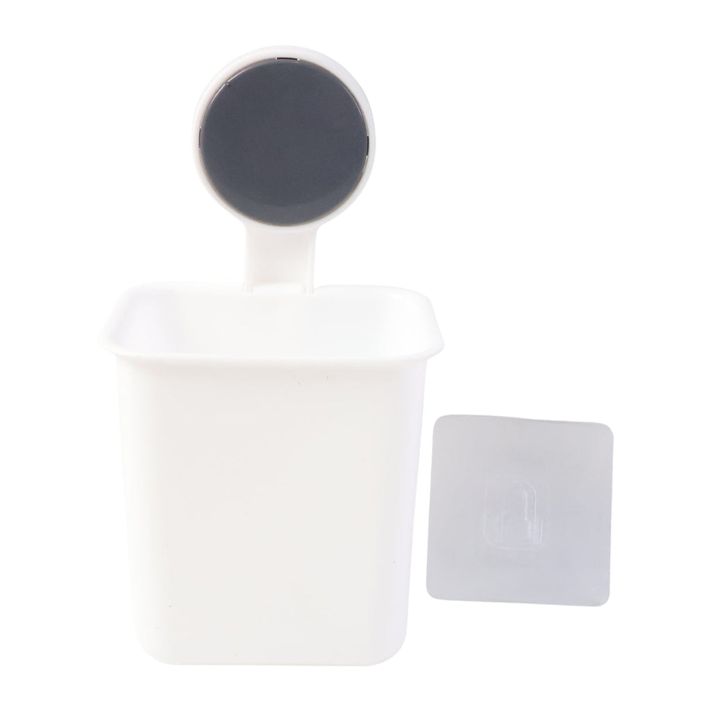 No-drill wall mounted toothbrush holder in a modern bathroom setting for hygienic storage.