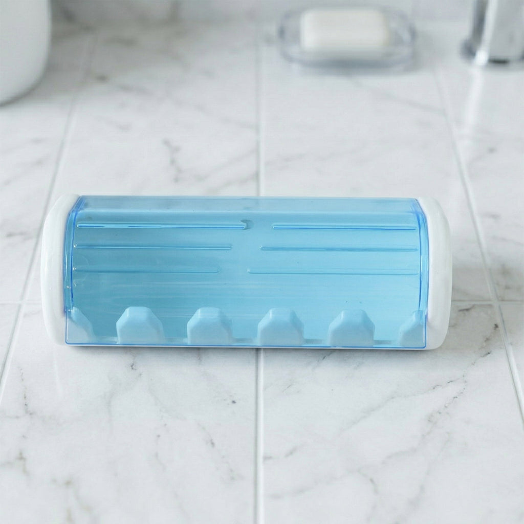 Front view of wall mounted protective toothbrush holder