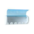 Protective cover opened showing toothbrush slots