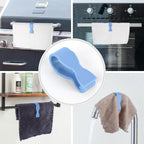 Towel clips holding towels on a rack in a bathroom setting