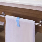 Demonstration of clip-on towel clips being attached to a rod