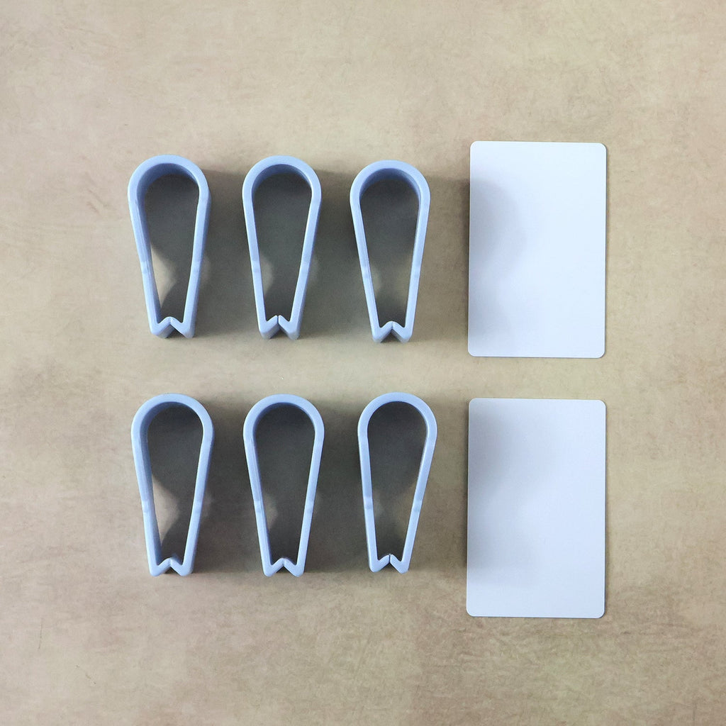 Towel clips holding clothes on a laundry line