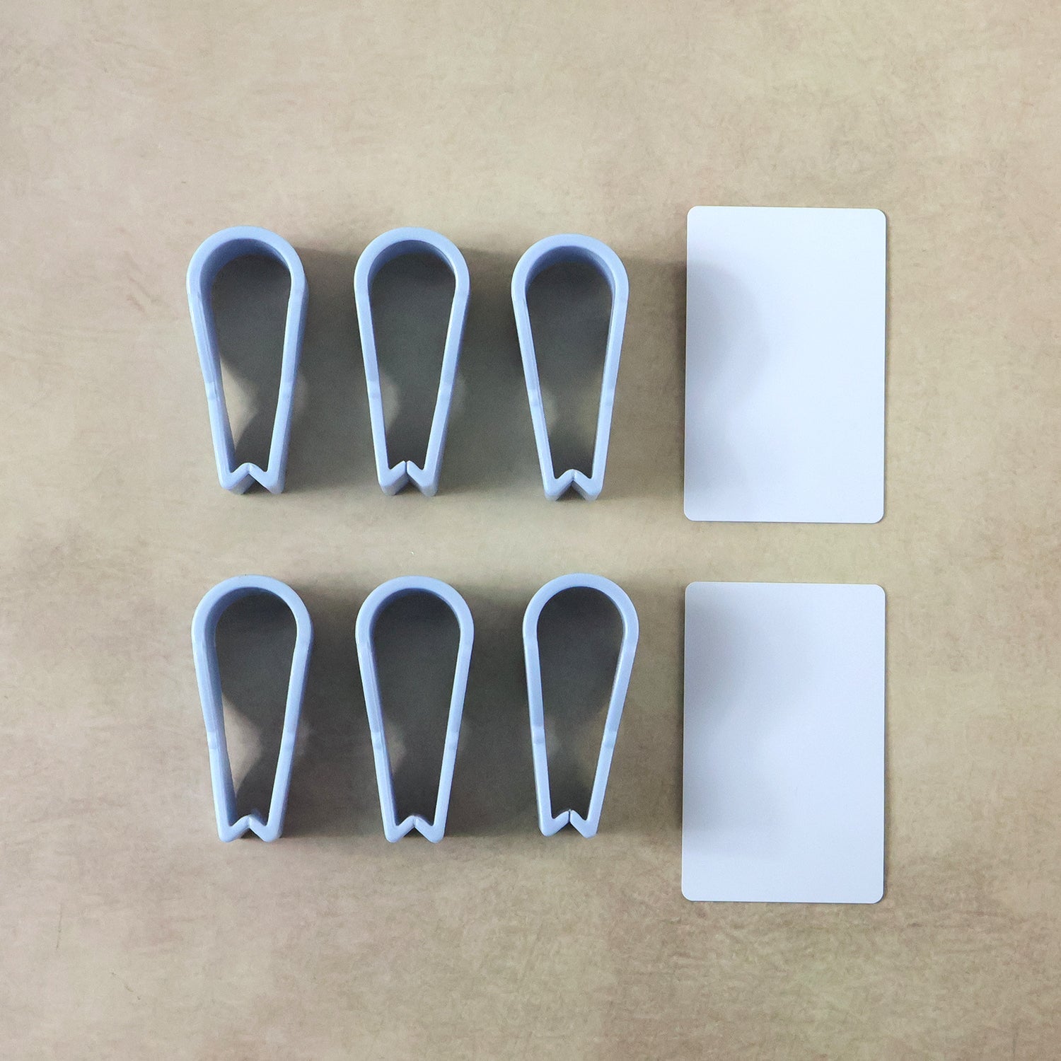 Towel clips holding clothes on a laundry line