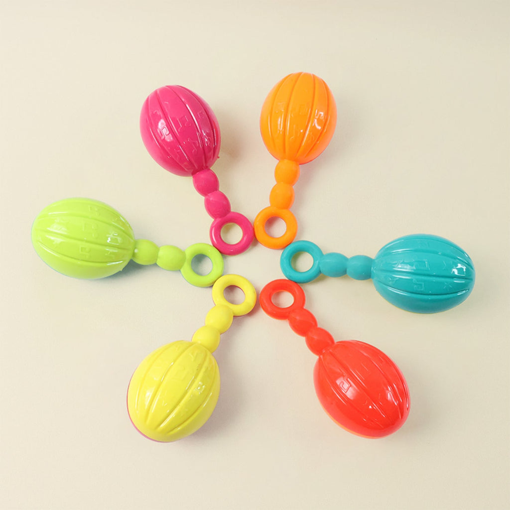 Jingly baby rattle producing soft musical sounds