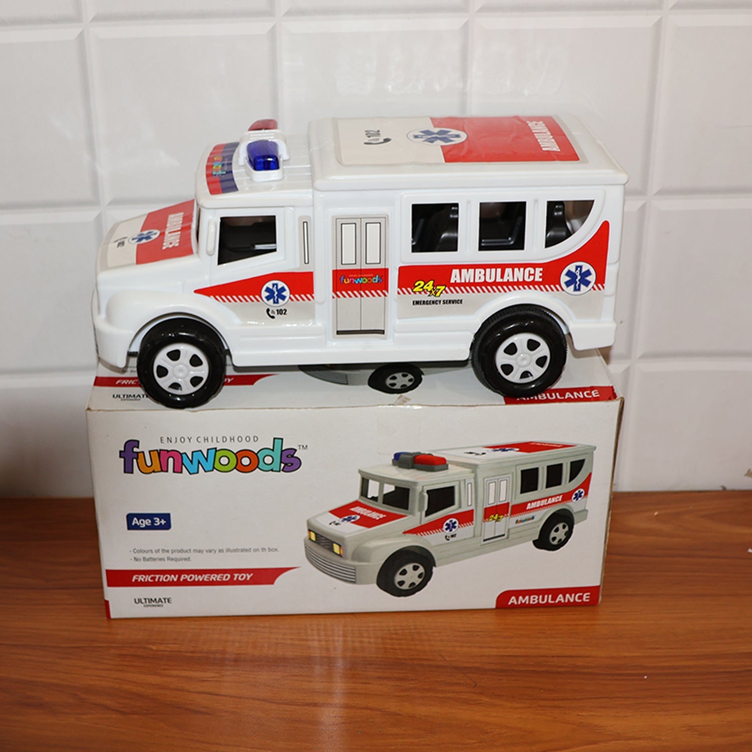 Close detail of realistic design on friction powered ambulance toy