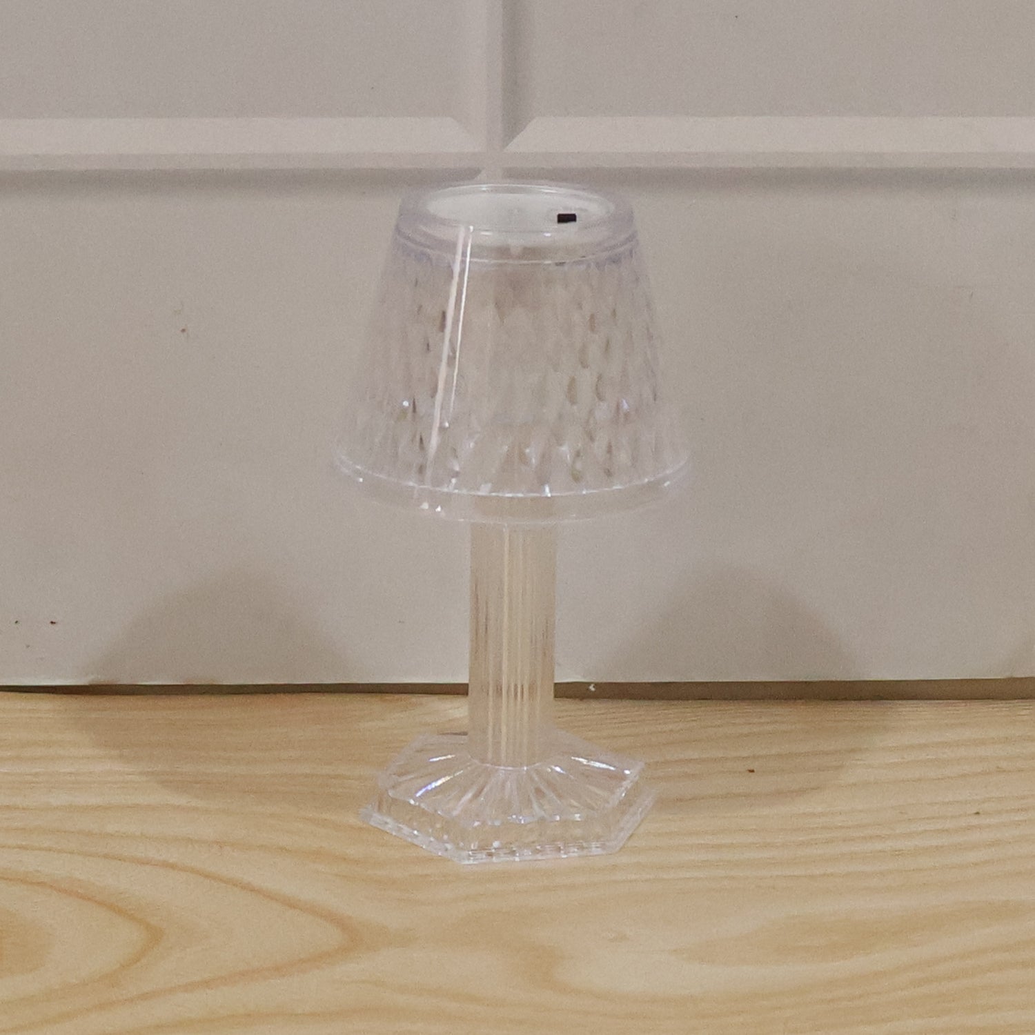 Decorative crystal lamp perfect for adding sparkling light to any corner.