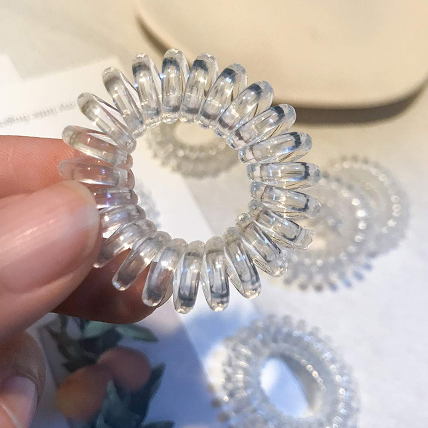 Strong and flexible transparent hair ties
