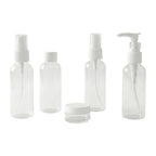 Travel bottle combo including pump, spray, and flip cap refillable containers
