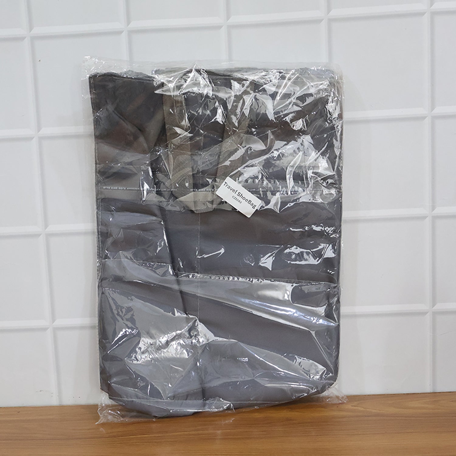 Travel shoe storage bag designed to keep footwear organized and clean