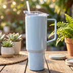 Ergonomic handle on durable plastic travel tumbler.