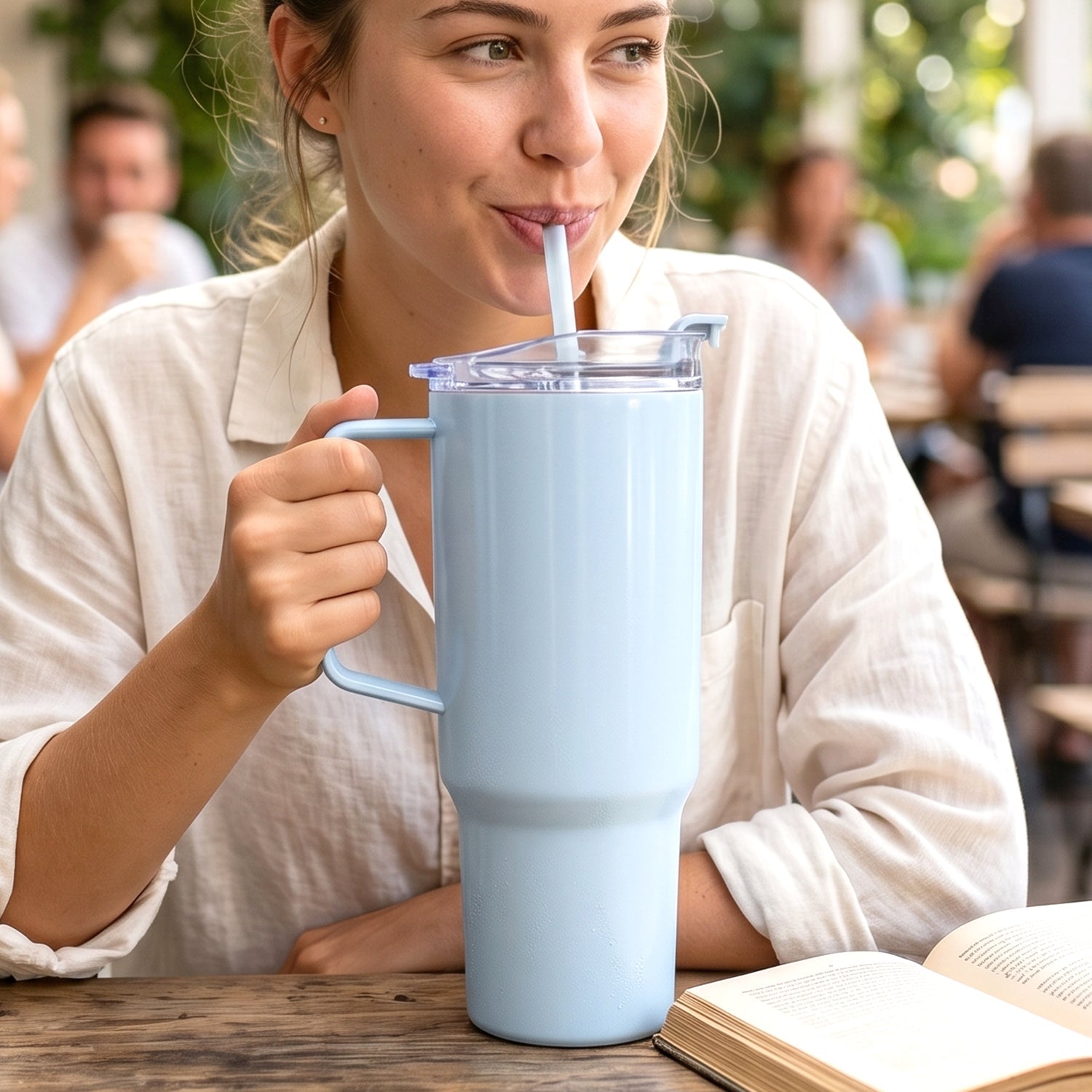 Durable plastic hydration tumbler on an office desk.