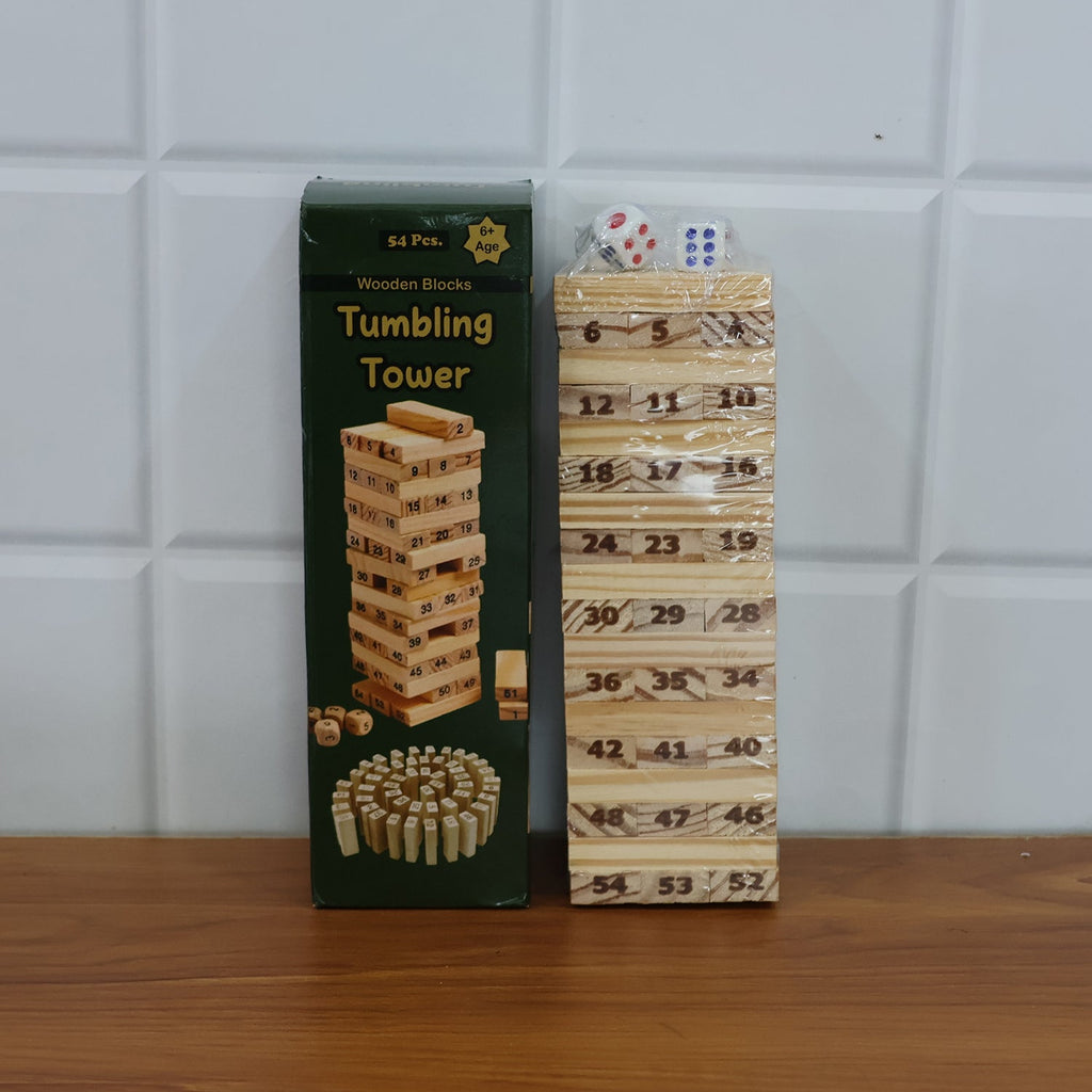 Family members gathered playing the Tumbling Tower wooden block game