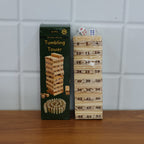 Family members gathered playing the Tumbling Tower wooden block game