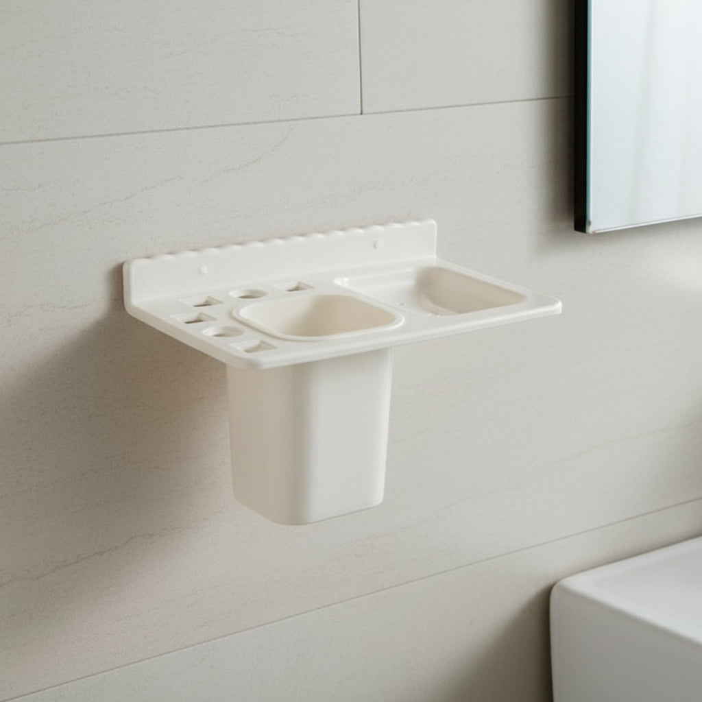 Compact and sleek white wall mounted toothbrush holder suitable for small bathrooms.