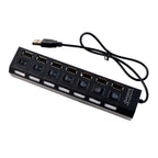 LED indicators on the 7 port USB hub showing active data ports.