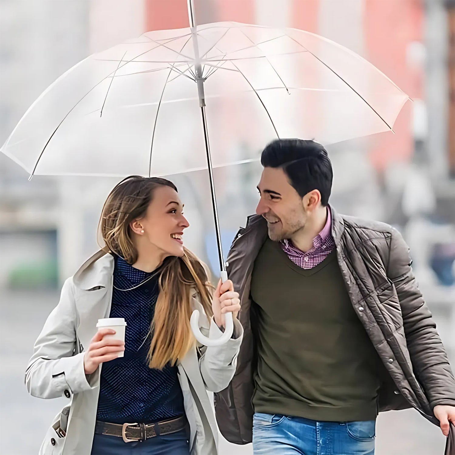 Open transparent dome umbrella displaying metal shaft and reinforced ribs