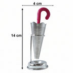 Loose leaf tea brewing inside a glass cup with the elegant stainless steel umbrella tea infuser.