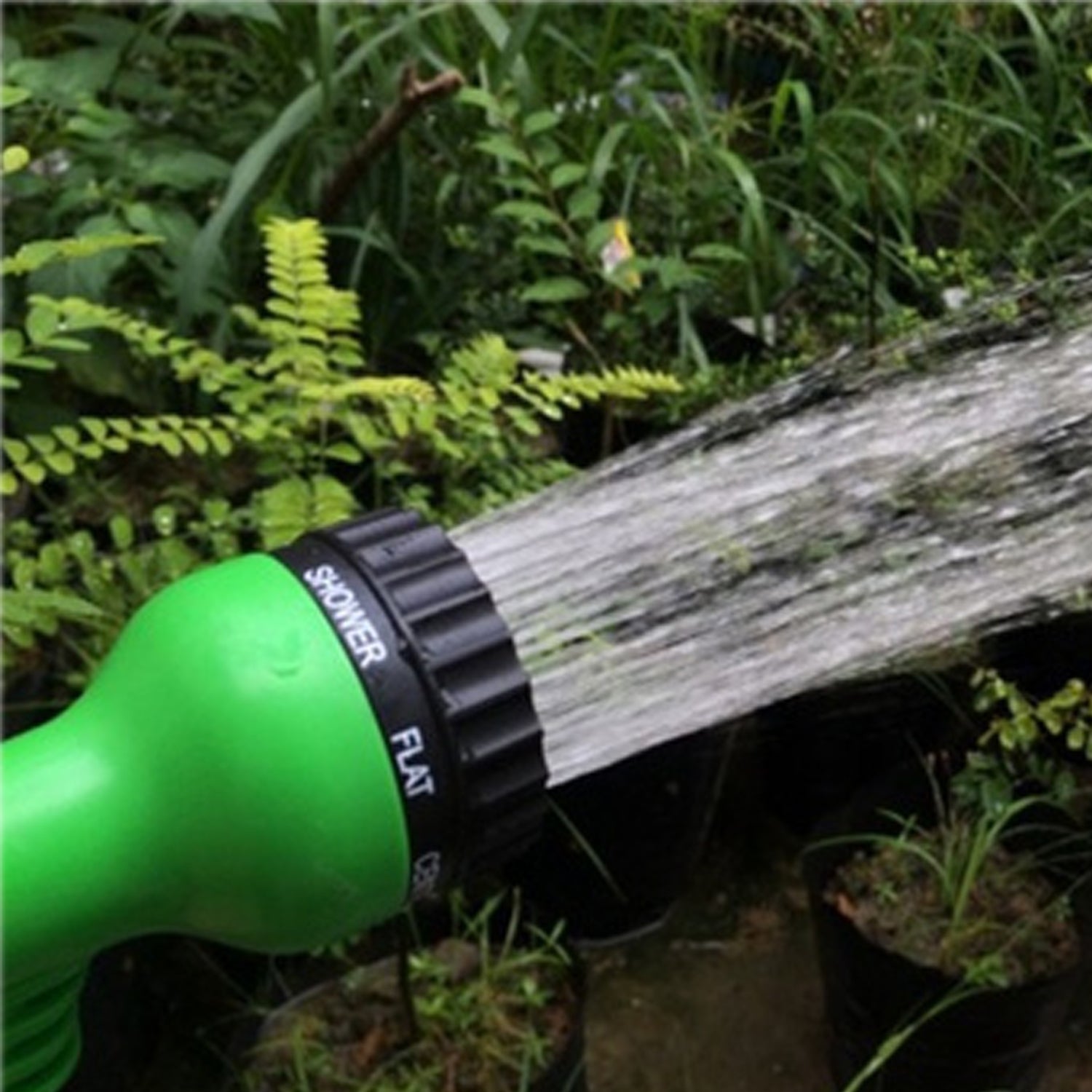 Versatile water spray gun for gardening and outdoor cleaning.
