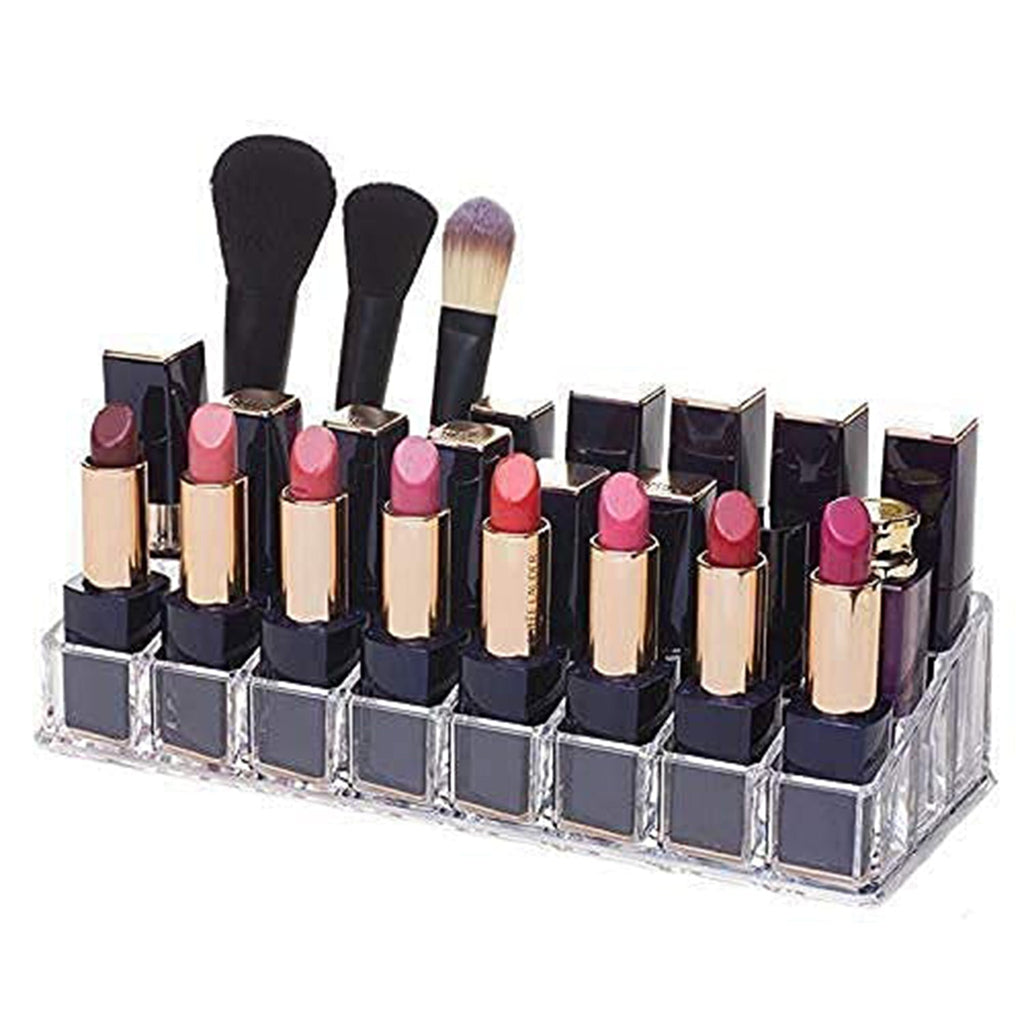 Clear acrylic lipstick holder with 24 sections, showcasing its organized cosmetic storage on a vanity.