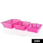 Multiple size plastic fruit baskets, styled to organize fresh produce.