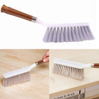 Sturdy household cleaning brush with a long handle, suitable for floors and various surfaces.