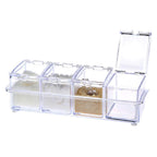 Kitchen counter with a stylish acrylic spice organizer.