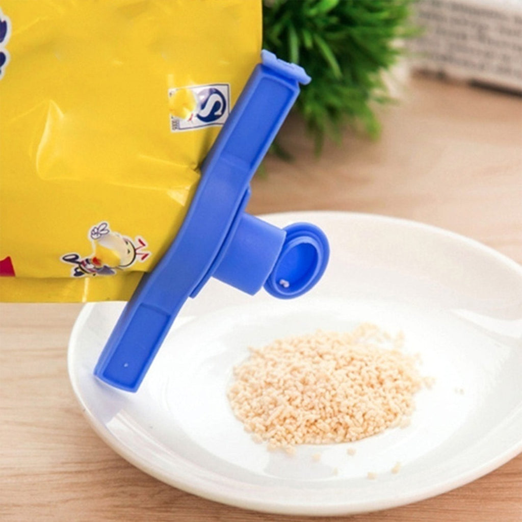 Food bag clip attached to a cereal bag, ready to pour.