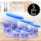 Stackable plastic food containers of different sizes holding spices and grains.