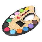 Children using a non-toxic watercolor set to create art.