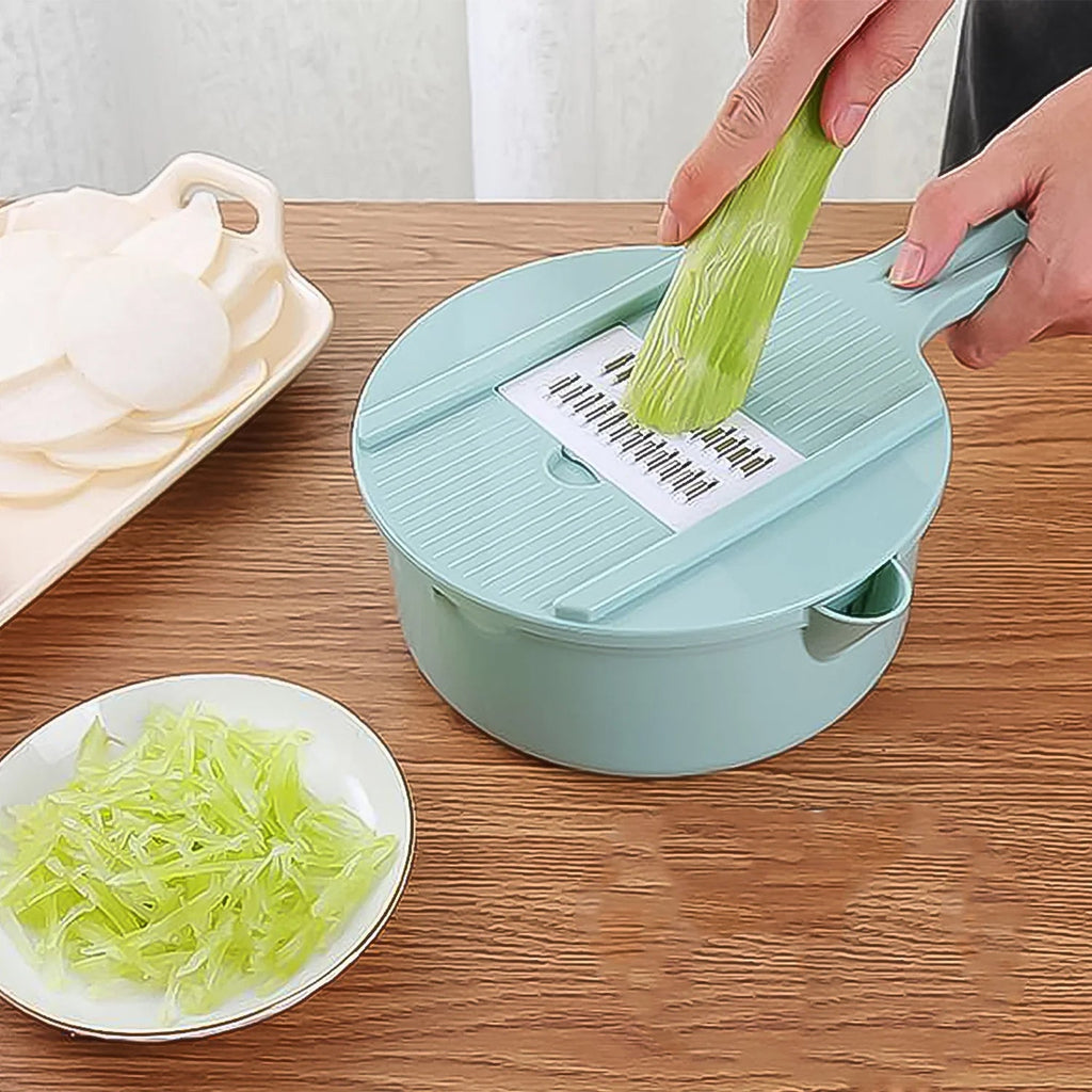 Handy kitchen cutter and grater combination tool for slicing
