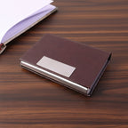 Business card holder closed with magnetic flap for secure storage