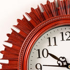 Side profile of the round wooden look wall clock, showcasing its slim design and plastic finish.
