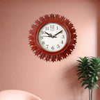 Stylish wooden look wall clock on a light-colored wall, showing accurate time.
