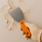 Durable putty knife blade made from high-quality CR-V alloy steel, shown at an angle.