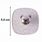 Side view showing clear adhesive wall hook mounted seamlessly on a wall.