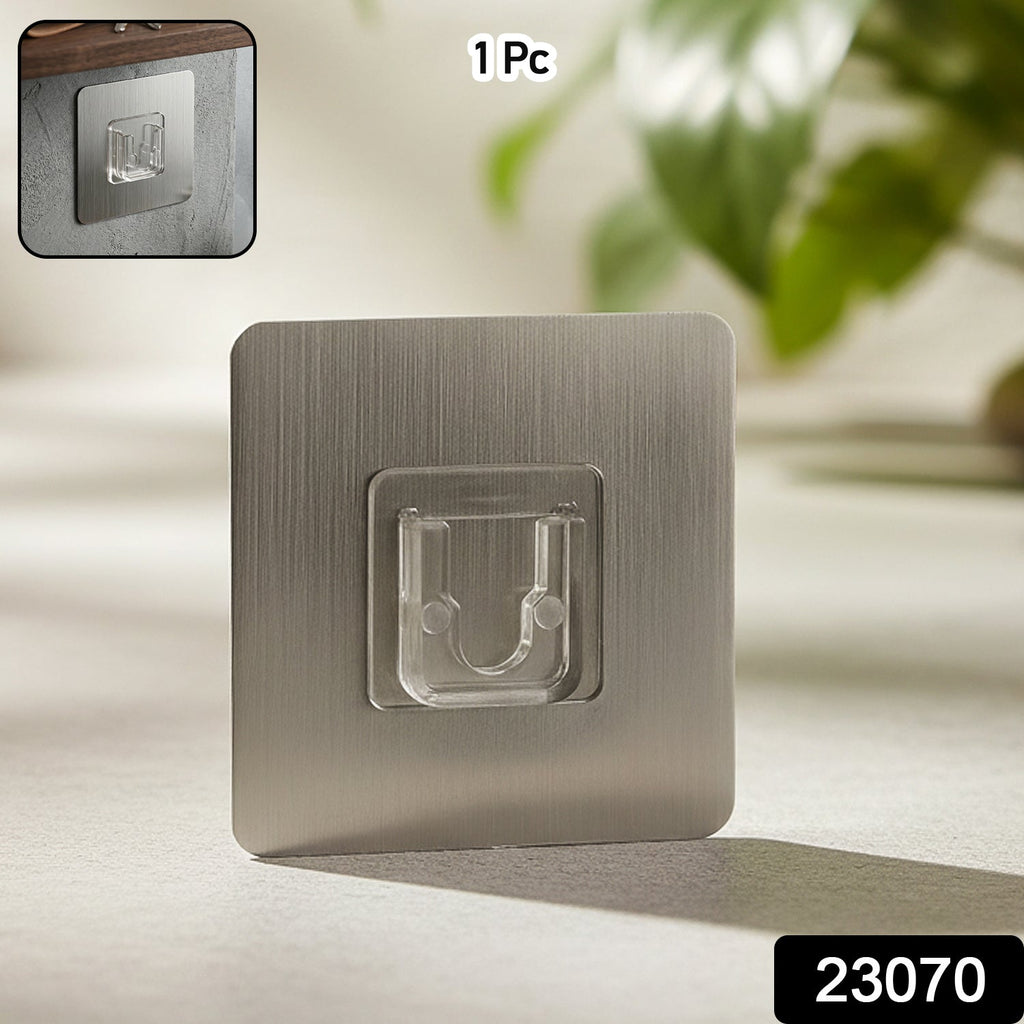 Strong adhesive wall hook attached to smooth surface for hanging items