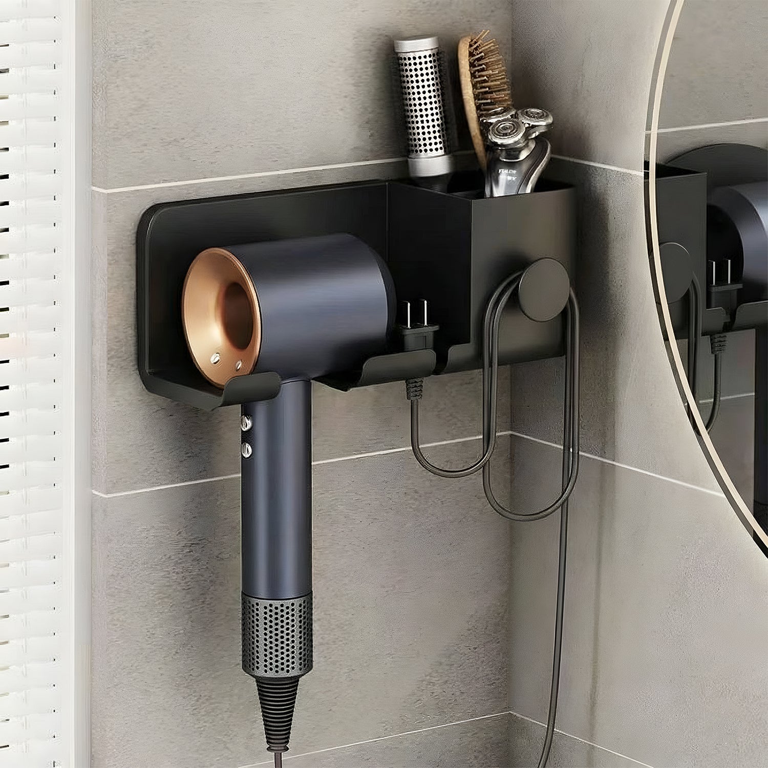 Dryer rack mounted on bathroom wall holding hair styling tools